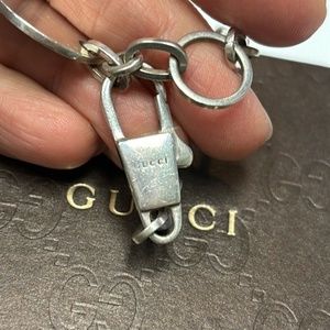 Gucci vintage sterling silver round disc logo necklace.